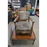 Oak upholstered armchair plus a teak coffee table