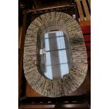 Mirror with newspaper frame