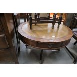 Mahogany drum style coffee table with leather inlay