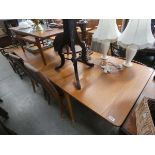 1970's teak extending dining table with 4 upholstered chairs