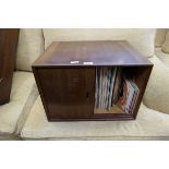 Cabinet with sliding doors and a small qty of vinyl records