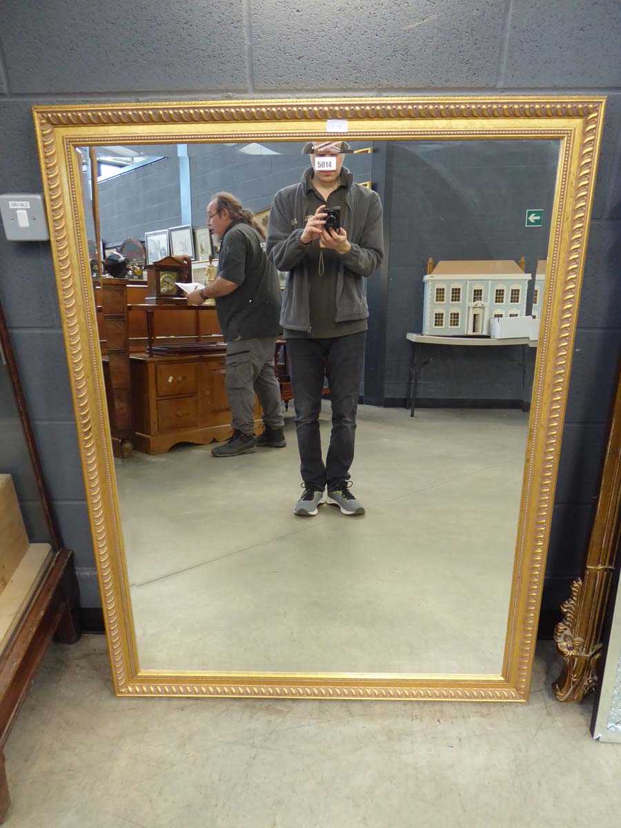 Rectangular gilt framed and bevelled wall mirror