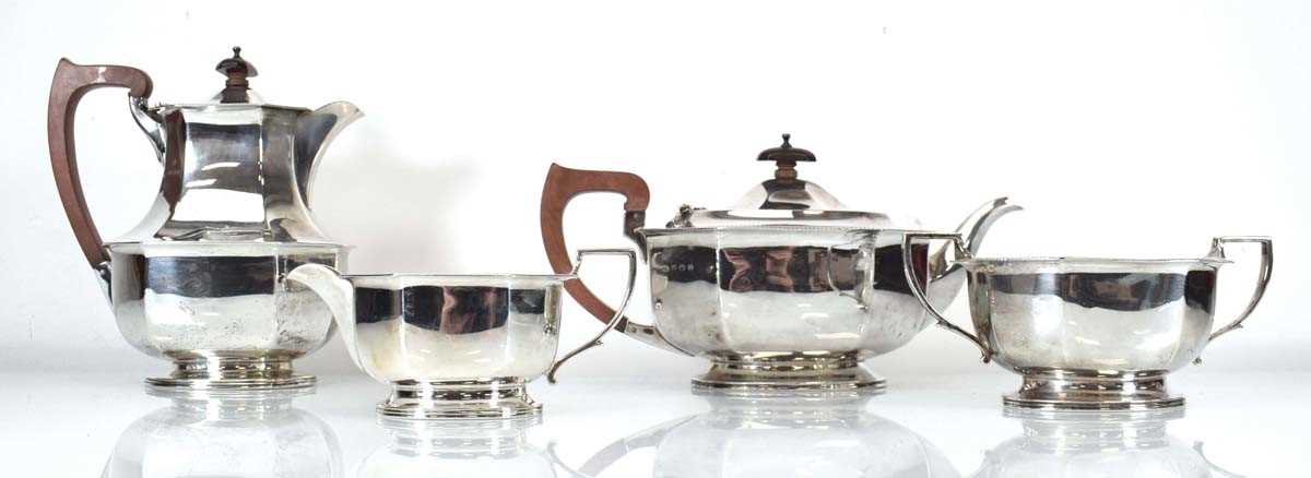 An early 20th century silver four piece tea service of canted vase shaped form, Adie Brothers,