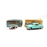 A Japanese Alps tinplate friction Ford with barking dog and a Japanese tinplate Douglas DC8