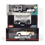 A Minichamps 1:18 scale Morris Minor Traveller, a Kyosho Caterham Super 7 and a Land-Rover