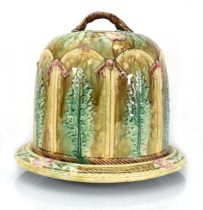 A majolica cheese dome and stand, relief decorated with stylised leaves and flowerheads on a mottled