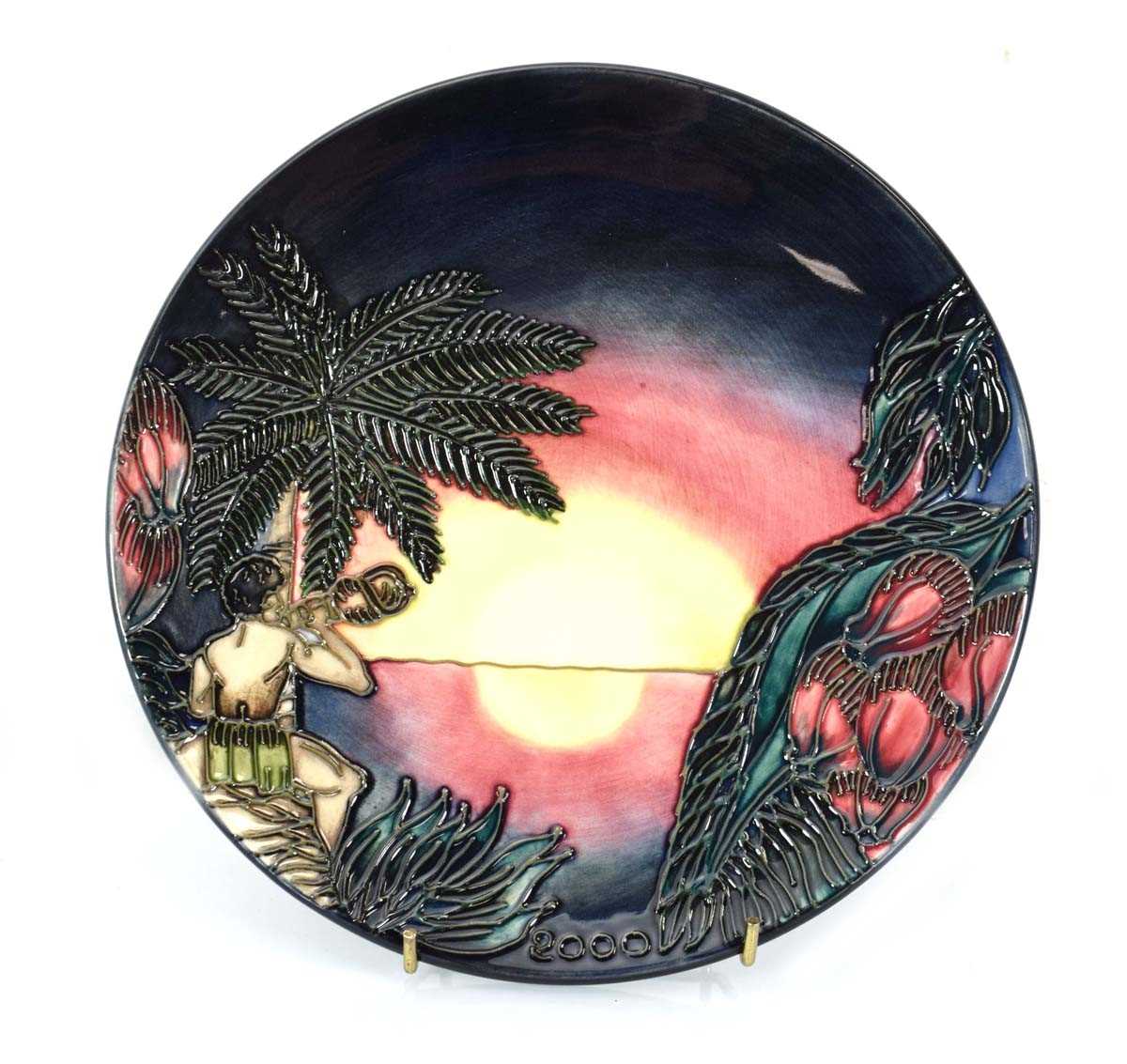 A Moorcroft limited edition cabinet plate for 2000 decorated with a tropical island at sunset, d.