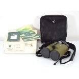 A cased pair of Swarovski Optik SLC binoculars, 10 x 42 WB, with slip case and paperworkCase and