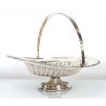 A late Victorian silver basket of oval form with swing handle, maker RP, London 1900, w. 30 cm, 23