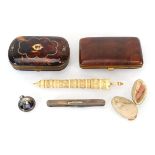 A small group of collectables including two faux tortoiseshell purses, a bone pin holder, a horn