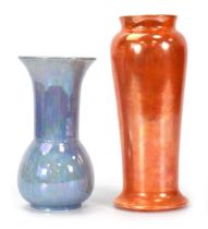Two 1920's Ruskin pottery lustre vases including a lilac example, h. 19 cm, and an orange example