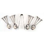 A set of twelve late Victorian silver scroll end teaspoons and a pair of matching sugar nips, Walker
