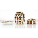 A Royal Crown Derby jar and cover decorated in the imari palette, h. 11 cm, together with another