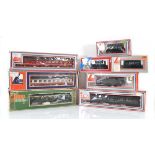 A Lima OO gauge tank loco and seven items of rolling stock, all boxed (8)