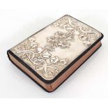 An Edwardian silver mounted common prayer book, repousse decorated with stylised flowers, maker BP