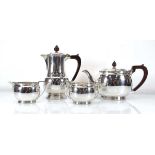 A mid 20th century silver four piece tea service of squat vase shaped form, maker R&B, Sheffield