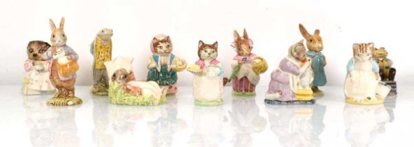 Eleven Beswick and Royal Albert Beatrix Potter figures comprising:Mrs Flopsy Bunny,Sir Isacc