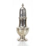 An early 20th century silver sugar sifter of typical vase shaped form, Goldsmiths & Silversmiths Co.
