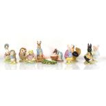Eleven Beswick and Royal Albert Beatrix Potter figures comprising:Anna Maria,Sally Henny Penny,Peter