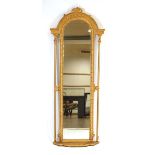 A 19th century and later giltwood wall mirror of rectangular form with a domed top, h. 155 cm
