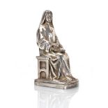 A metalware figure modelled as a seated nun, h. 11.5 cm