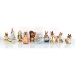 Ten Beswick and Royal Albert Beatrix Potter figures comprising:Squirrel Nutkin,Amiable Guinea-Pig,