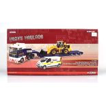 A limited edition Corgi Heavy Haulage 1:50 scale CC13427 Man TGA Nooteboom low loader JCB 456