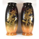 A pair of Royal Bonn vases of imposing proportions, each decorated with a gilt iris on a mottled