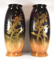 A pair of Royal Bonn vases of imposing proportions, each decorated with a gilt iris on a mottled