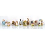 Eleven Beswick and Royal Albert Beatrix Potter figures comprising:Amiable Guinea-Pig, Mr Jackson,