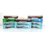 Seven Marklin HO gauge coaches, each in maroon/cream livery:4055,4056,4057 x 2,4058 x 2 and4085,