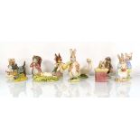 Eleven Beswick and Royal Albert Beatrix Potter figures comprising:Timmy Tiptoes,Mrs Rabbit, Johnny