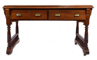 A late 19th/early 20th century mahogany writing desk in the manner of Pugin, the tooled green