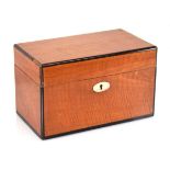 A 19th century satinwood and crossbanded tea caddy with a mother-of-pearl escutcheon, w. 24 cm