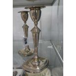 A pair of early 20th century silver dwarf candlesticks of slender tapered form, Hawksworth, Eyre &