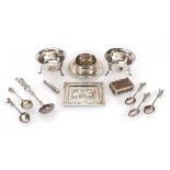 A mixed group of silver and metalware comprising a pair of salts, an ashtray, a napkin ring, a