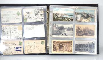 An album containing approximately two hundred postcards including Ludgate Circus, Mersey Tunnel,