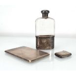An Edwardian silver mounted hip flask, makers marks indistinct, London 1905, l. 13.5 cm, and early