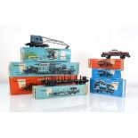 Seven items of Marklin HO gauge rolling stock comprising car transporters, crane wagon etc..4504 x