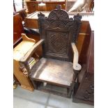 A 17th century and later carved oak Wainscott chair