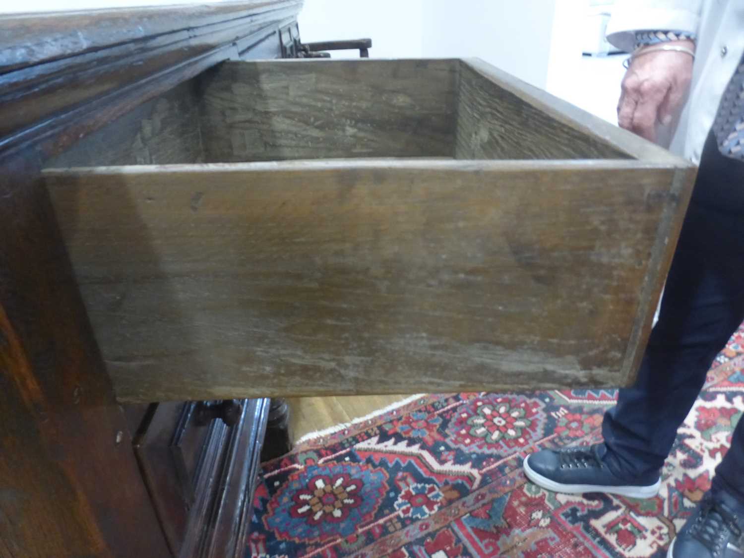 An oak dresser base incorporating 17th century elements, the central carved panelled door flanked by - Bild 21 aus 24