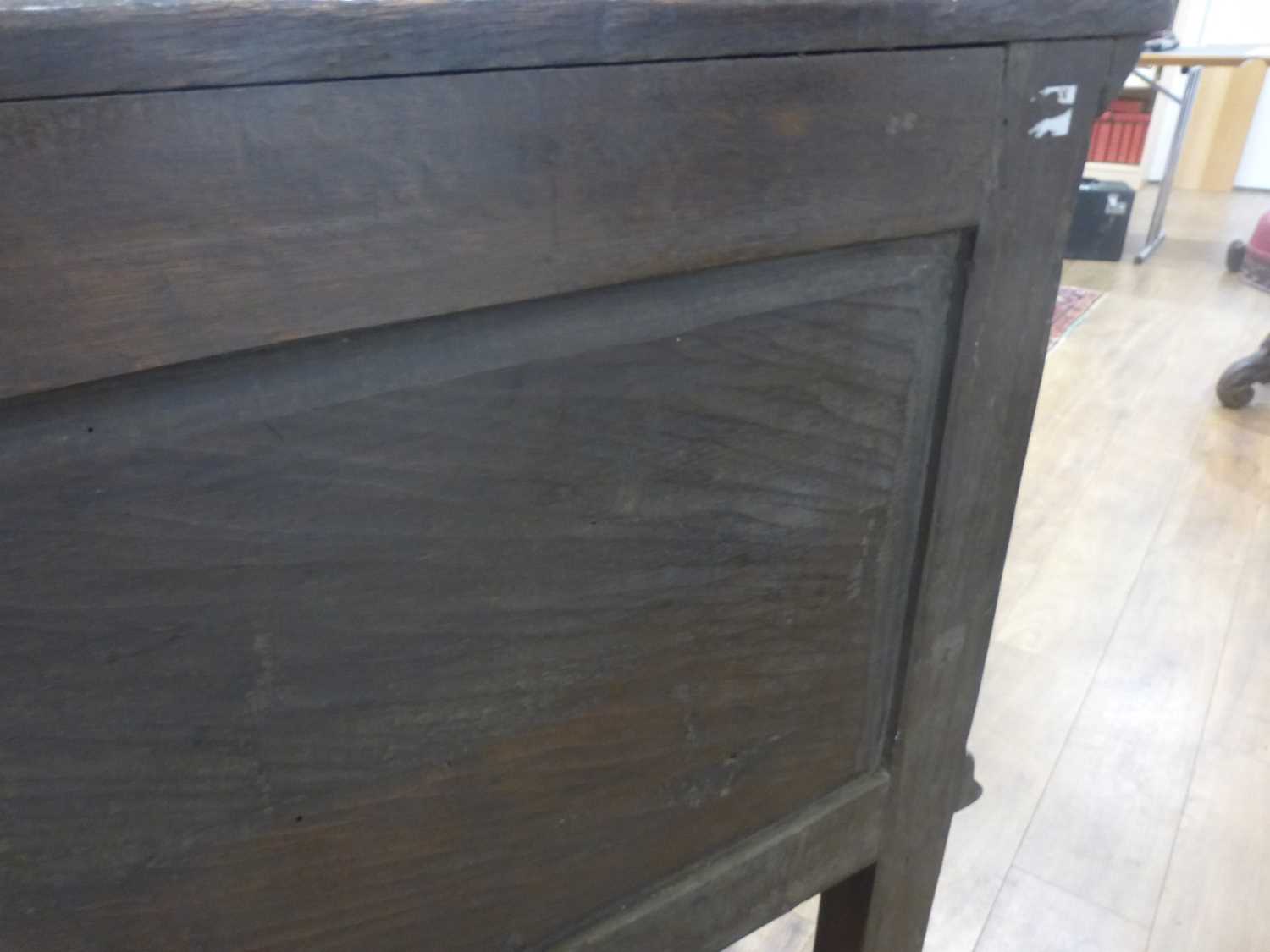 An oak dresser base incorporating 17th century elements, the central carved panelled door flanked by - Bild 9 aus 24