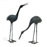 A pair of bronze verdigris figures modelled as storks, max. h. 84 cmThere is some rubbing to one