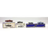 Four SMTS kit built models comprising:RL18 Lotus 7,15 Lotus Europa,CLII Aston Martin DB5 and2