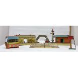 A small group of Hornby O gauge buildings and trackside items including station, signal cabin,