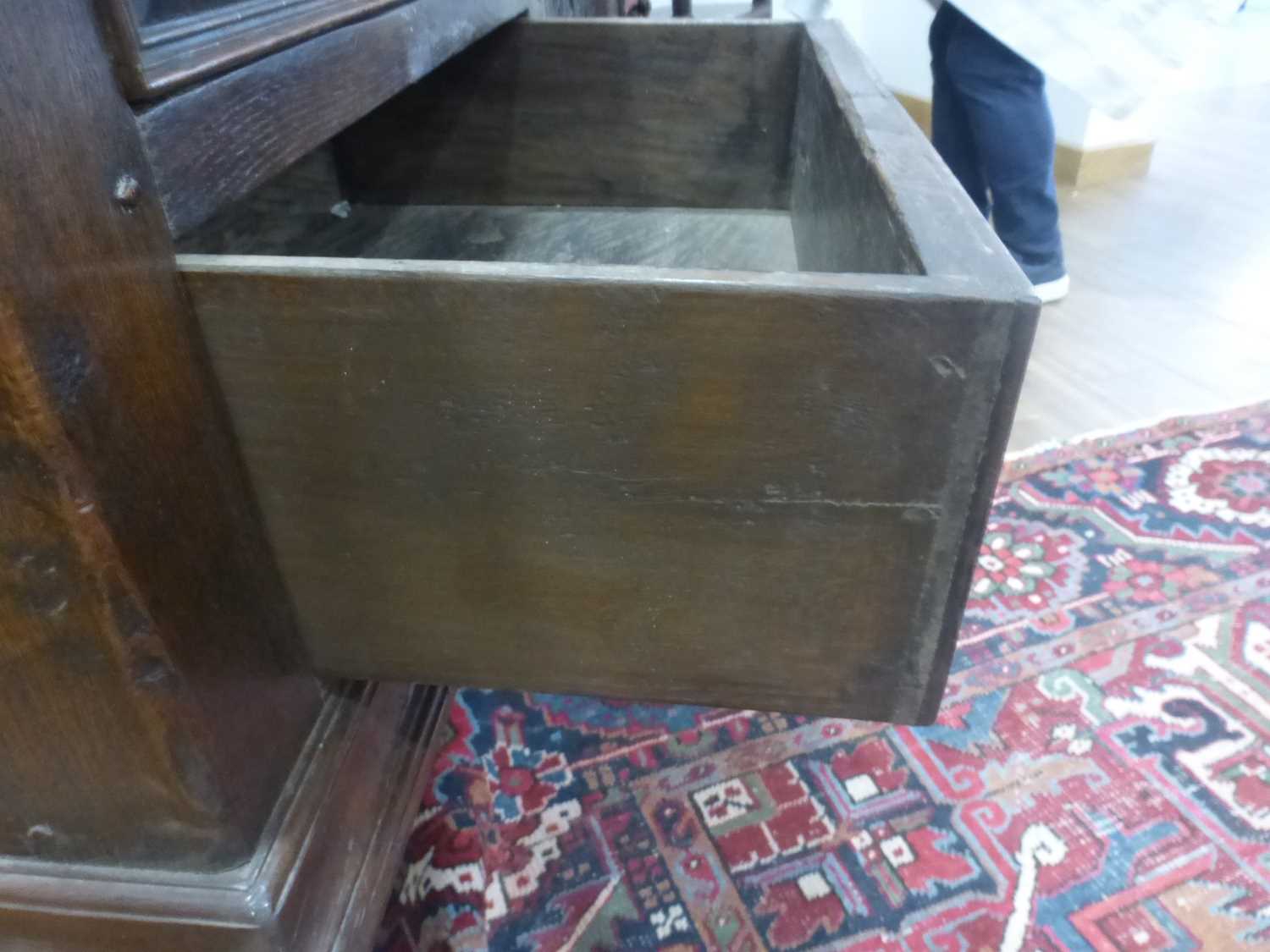 An oak dresser base incorporating 17th century elements, the central carved panelled door flanked by - Bild 18 aus 24