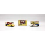 A Corgi Whizzwheels 381 beach buggy, a Dinky 218 Lotus Europa and a Dinky 223 McLaren M8A Can AM,