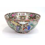 A Chinese Export fruit bowl, typically decorated in coloured enamels with court scenes within