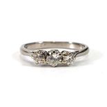 A platinum ring set three graduated old cut diamonds,ring size K,2.6 gms