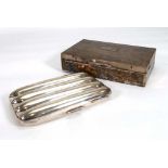 An Edwardian silver and parcel gilt four section cigar case, maker JG, Birmingham 1904, l. 13 cm,